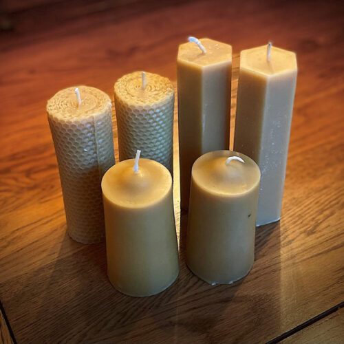 Collection of handmade pure beeswax candles from candle making workshop